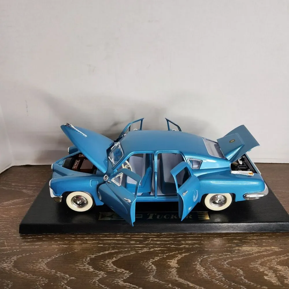 Road Legends 1948 Aqua Blue Tucker 1:18 Diecast Car # 92268 With Box and Stand